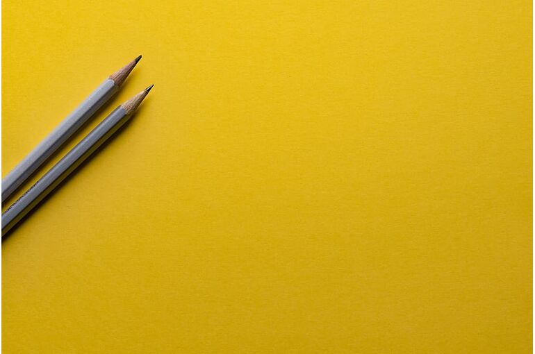 yellow-background-pencil-designer